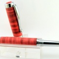 0093 - Chrome Atrax Rollerball Pen (12642 visits) This pen was created using red dyed Curly Maple. Curly Maple has astounding chatoyance, and the dye ... 0093 - Chrome Atrax Rollerball Pen