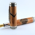 0121 - Segmented Australian Lacewood Rhodium Emperor Fountain Pen (21174 visits) This large fountain pen features segmented barrels crafted from multiple species of wood. The main p... 0121 - Segmented Australian Lacewood Rhodium Emperor Fountain Pen
